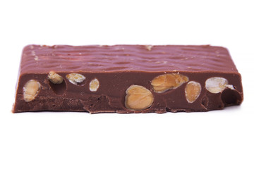 chocolate nougat with almonds isolated on white