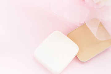 Cosmetic Foundation on pink with copy space