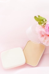 Cosmetic Foundation on pink with copy space