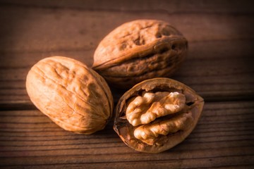 group of nuts on wooden table