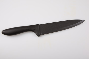 Hand black drawn cooking knife in white background