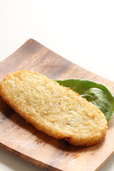 Hash brown on wooden plate for breakfast image