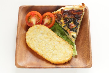 Hash brown on wooden plate for breakfast image