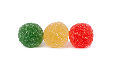 Fototapeta na wymiar Colorful marmalade isolated on white background. Delicious jujube balls.
