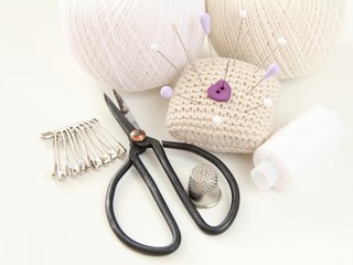 sewing accessories on white background
