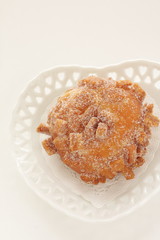 Sugar deep fried bread on dish with copy space