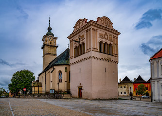 Fototapeta premium Gothic church and Renaissance bell tower in the main square of Spisska Sobota in Poprad, Slovakia
