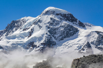 Colorful mountain landscape of the Swiss Alps on a summer day