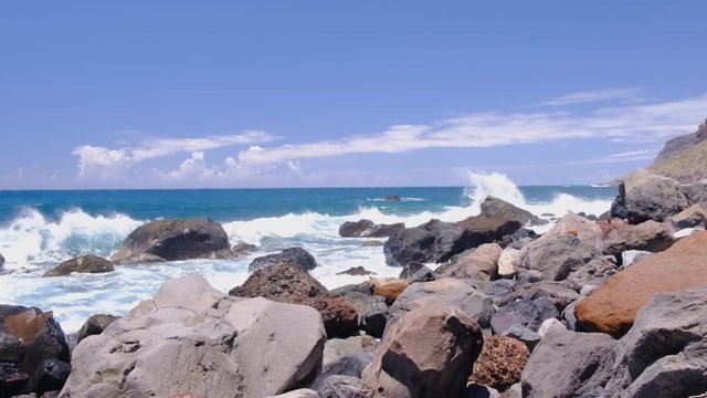 Waves hitting the South coast of Madeira island at Jardim do Mar in the middle of the Atlantic Ocean. Slow motion clip at half speed.