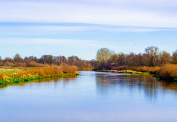 Fototapeta na wymiar landscape of a beautiful fast river with steep banks