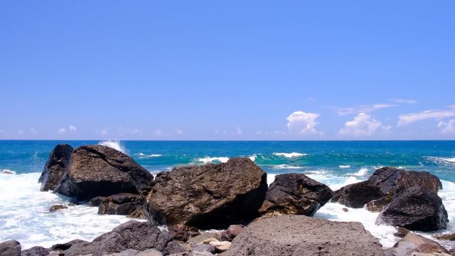 Waves hitting the South coast of Madeira island at Jardim do Mar in the middle of the Atlantic Ocean. Slow motion clip at half speed.