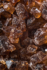 Amber mineral texture as natural background. Sun stones of different sizes, shapes and colors. A lot of big and small diggers. Fossil resin of wood. Material for jewelry. Top view, flat lay