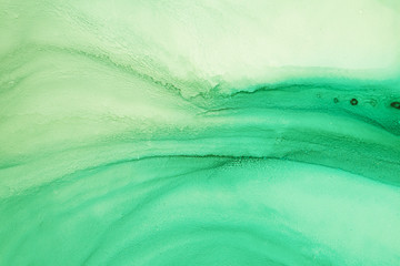 Alcohol ink sea texture. Contemporary art. Abstract art background. Multicolored bright texture. Fragment of artwork. Modern art. Inspired by the sky, as well as steam and smoke. Trendy wallpaper.