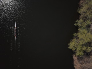 Aerial Of Tourists Rowing On River