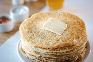 Hip of thin russian pancakes, called blini, at restaurant.