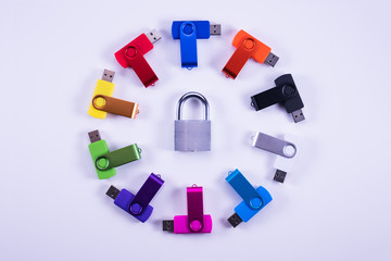 Obraz premium Privacy and data protection: USB sticks with locked padlock