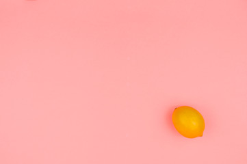 Lemon on a pink background.