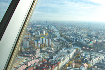 Fototapeta na wymiar Berlin city view from tv tower window during day time