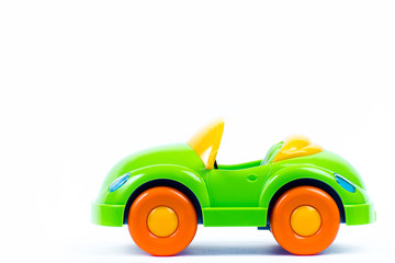 Plastic toy car on white background
