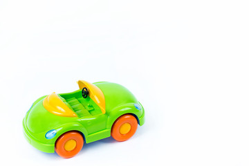 Plastic toy car on white background