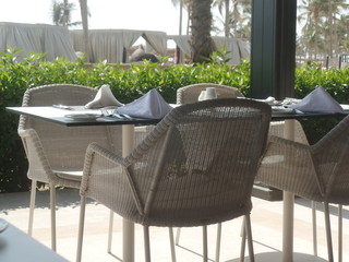 Tables and chairs on a restaurant terrace