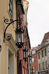 Fototapeta na wymiar Riga, Latvia, November 2019. Beautiful vintage lanterns on a historic street in the city center.