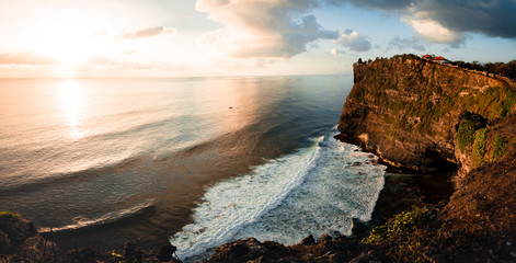 Beautiful Panoramic view of an Iconic Famous Place, Uluwatu Temple, during a vibrant summer...
