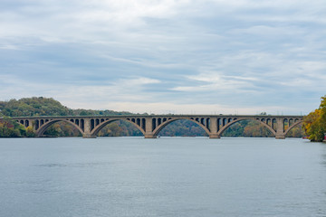Fototapeta na wymiar Old Concrete Arch Bridge over the Potomac River linking Washington D.C. to Arlington Virginia