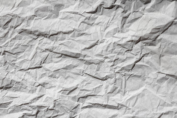 Crumbled white paper texture background. Creases and scratches. Old letter template. Craft paper for package and parcels. Packaging process.