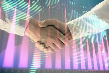 Fototapeta na wymiar Multi exposure of forex graph and world map on abstract background with two businessmen handshake. Concept of success on international markets