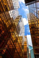 Fototapeta premium Symmetrical mirrored office buildings in Hong Kong