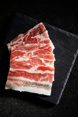 Thin sliced raw pork BBQ 