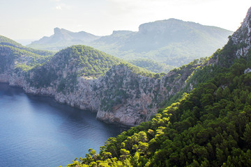 View of Coast with Beautiful Green Forest in Foreground at Mirador Es Colomer, Mallorca, Spain 2018 - 302918153