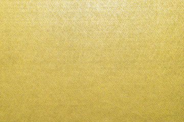 Gold texture background metallic golden foil or shinny wrapping paper bright yellow wall paper for...