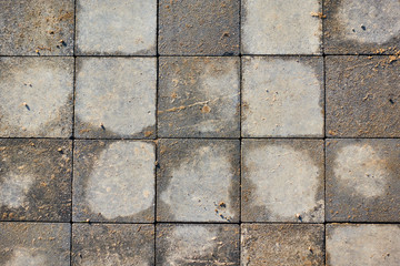 Paving slabs of square brick. Texture of concrete blocks