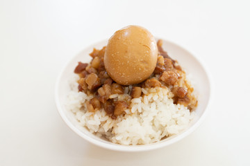 Braised pork and egg on rice. Soy-stewed pork rice. Taiwanese Cuisine
