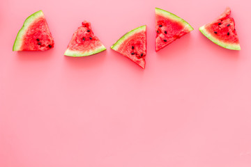 Slices of watermelon on pink background top view mock up