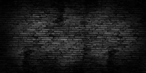 Black brick walls that are not plastered background and texture. The texture of the brick is black....
