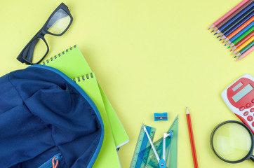 Student backpack and various school supplies. Studying, education and back to school concept....