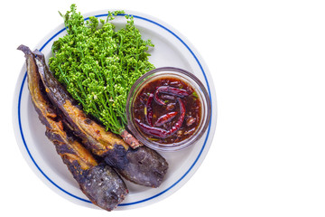 neem and sweet fish sauce with grilled catfish  isolate on white background