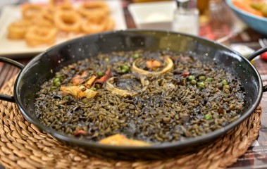 Spanish Black Rice Paella with Squid Ink Based Broth