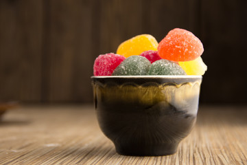 Holiday decoration. Jelly candy christmas, great design for any purposes. Many colors. Wood background.Sweet food.