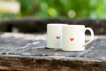 couple coffee cup on the old wood table