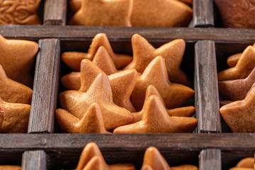 Collection of various gingerbread stars in a box