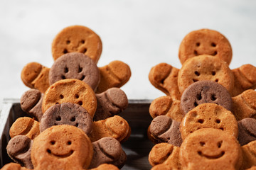 Collection of various gingerbread men in a box