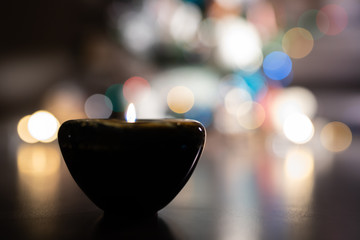 Glass Candle with defocused background