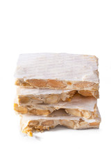 white nougat with stacked and isolated almonds