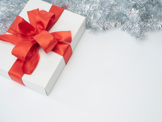 Gift boxes with red ribbon. Happy New Year 2020