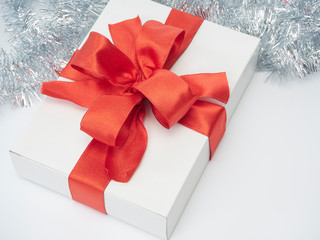 Gift boxes with red ribbon. Happy New Year 2020