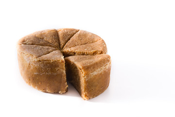 Traditional Christmas marzipan slice isolated on white background. Copy space	